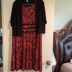 Sleeveless dress with black shrug